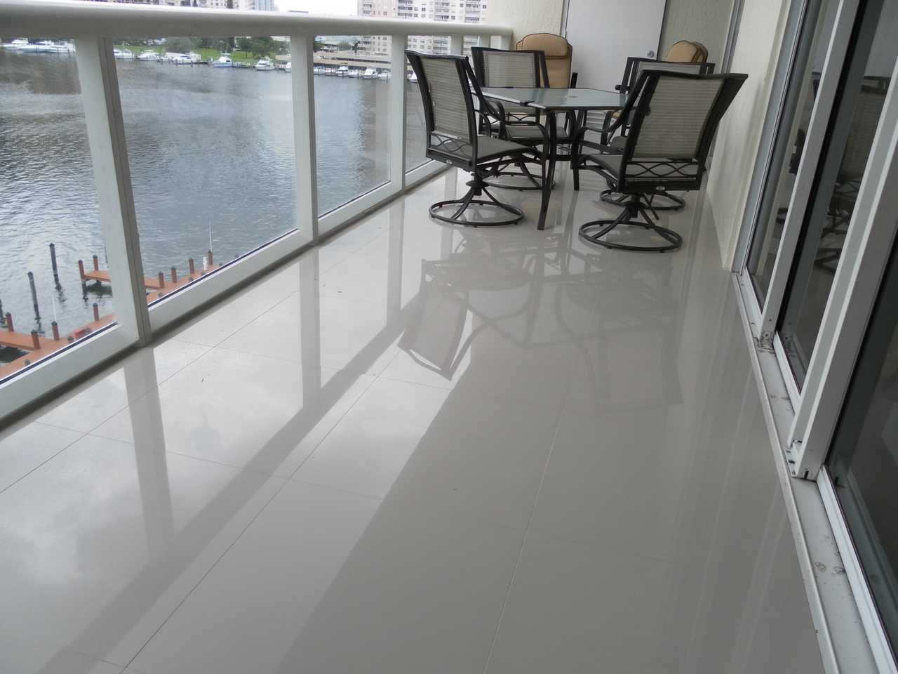Balcony tile flooring Miami Beach – condo renovation by Active Builders