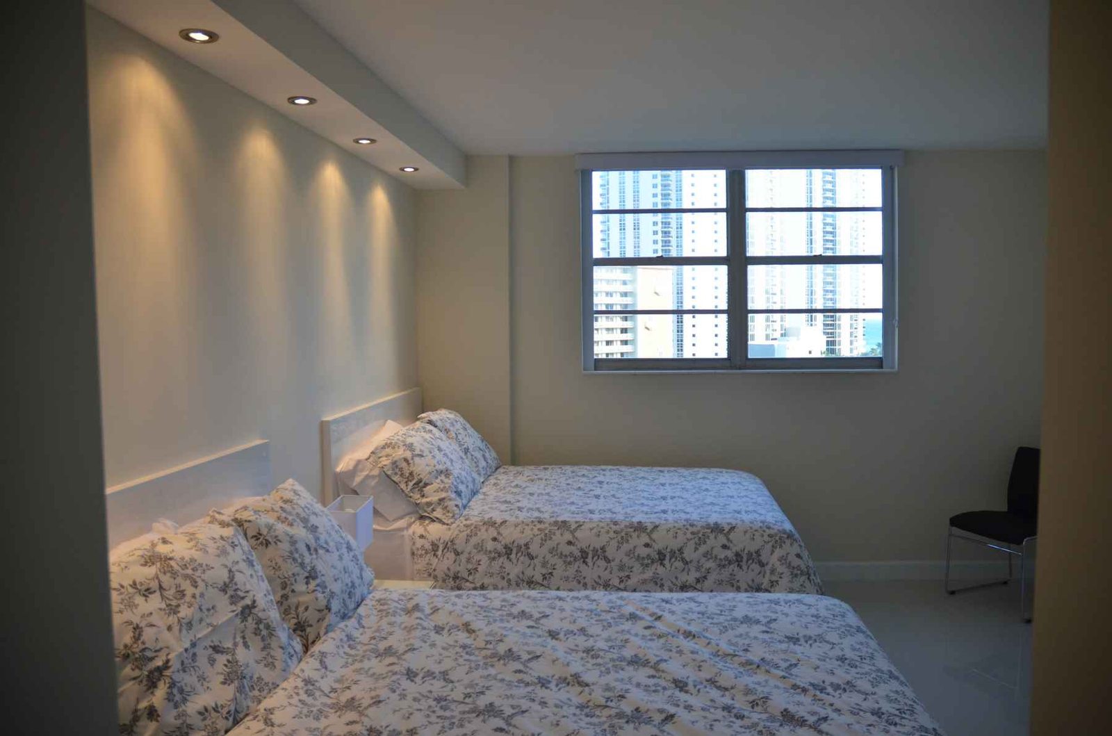 Home remodel Miami-Dade – spacious living renovation with custom lighting