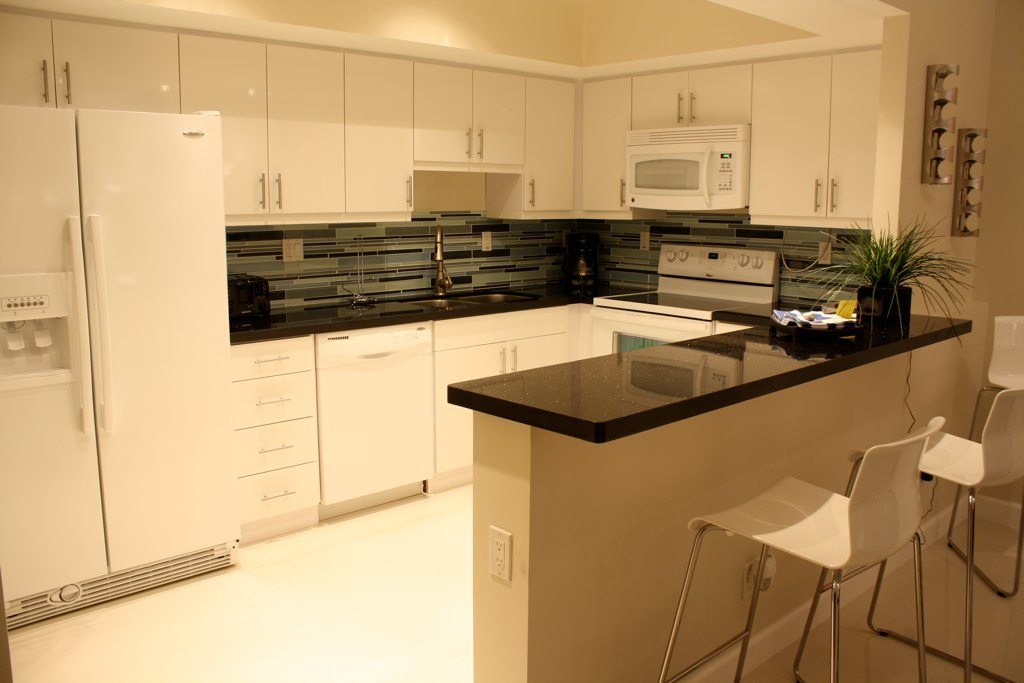 Kitchen remodeling Miami Beach – white cabinets by Active Builders